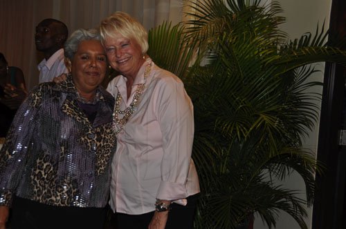 Janet Silvera
Michelle Rollins, patron of the Rose Hall Ball (right) hugs head of the SOS Children's Village, Jamaica, Marjory Kennedy during her Rose Hall Holiday Ball at the Hilton Rose Hall Resort and Spa  on Saturday, December 3 .