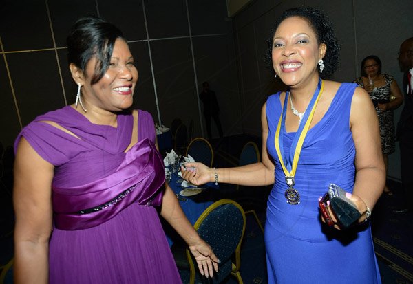 Rudolph Brown/ Photographer
Outgoing President  of the Rotary Club of St Andrew Judy Hylton, (right) and new president Marie Powell at the Rotary Club of St. Andrew Installation banquet at the Jamaica Pegasus Hotel in New Kingston on Tuesday, July 9, 2013.
