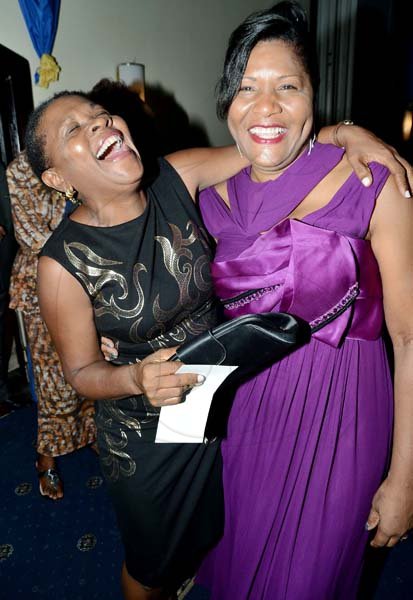Business Desk

Rudolph Brown/ Photographer
New president Marie Powell (right) has Dr Paulette Henry in stitches at the Rotary Club of St Andrew Installation banquet at the Jamaica Pegasus Hotel in New Kingston on Tuesday, July 9, 2013.