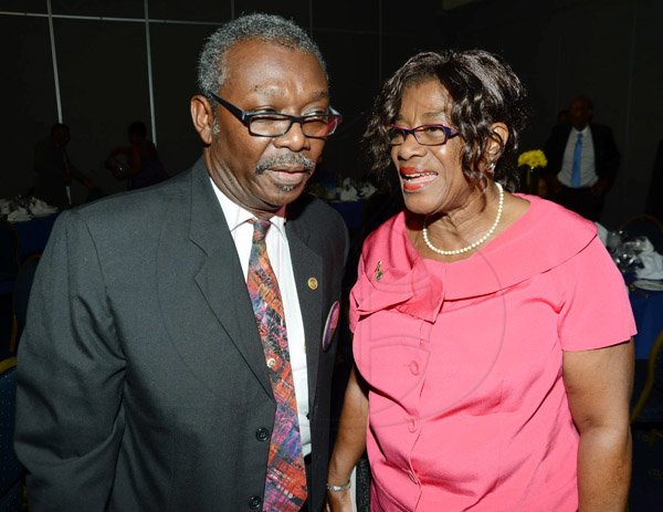 Rudolph Brown/ Photographer
Dr. Lloyd Ebanks-Green chat with Scarlett Gillings, at the Rotary Club of St. Andrew  Installation banquet at the Jamaica Pegasus Hotel in New Kingston on Tuesday, July 9, 2013.