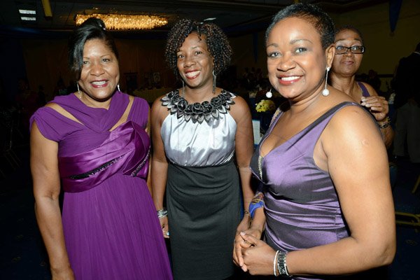 Rudolph Brown/ Photographer
Business Desk
New president Marie Powell, (left) pose with Minna Israel, (right) and Janice Henlin, Marketing Director of Mona School of Business and Management at the Rotary Club of St. Andrew Installation banquet at the Jamaica Pegasus Hotel in New Kingston on Tuesday, July 9, 2013.