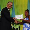 Ricardo Makyn/Staff Photographer
Errol McKenzie Executive Vice President Sagicor presents Ashanae Aris who will be attending St Mary High School   at the Sagicor annual GSAT awards ceremony at the Knutsford Court Hotel on Thursday 23.8.2012