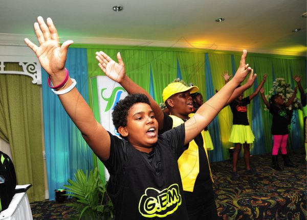 Ricardo Makyn/Staff Photographer
Members of the G.E.M Pantomime group performing at the Sagicor annual GSAT awards ceremony at the Knutsford Court Hotel on Thursday 23.8.2012