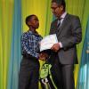 Ricardo Makyn/Staff Photographer
Richard Byles Presdent and Ceo  Sagicor presents Jordan Theoc Who will be attending Campion College   at the Sagicor annual GSAT awards ceremony at the Knutsford Court Hotel on Thursday 23.8.2012