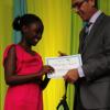 Ricardo Makyn/Staff Photographer
Richard Byles Presdent and Ceo  Sagicor presents Sydae Taylor who will be attending Campion College  at the Sagicor annual GSAT awards ceremony at the Knutsford Court Hotel on Thursday 23.8.2012
