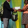 Ricardo Makyn/Staff Photographer
Errol McKenzie Executive Vice President Sagicor presents Mikayla McFarlane who will be attending Wolmer's Girls  at the Sagicor annual GSAT awards ceremony at the Knutsford Court Hotel on Thursday 23.8.2012