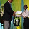 Ricardo Makyn/Staff Photographer
Errol McKenzie Executive Vice President Sagicor presents Geovanni Lewin who will be atteending Wolmers High School   at the Sagicor annual GSAT awards ceremony at the Knutsford Court Hotel on Thursday 23.8.2012