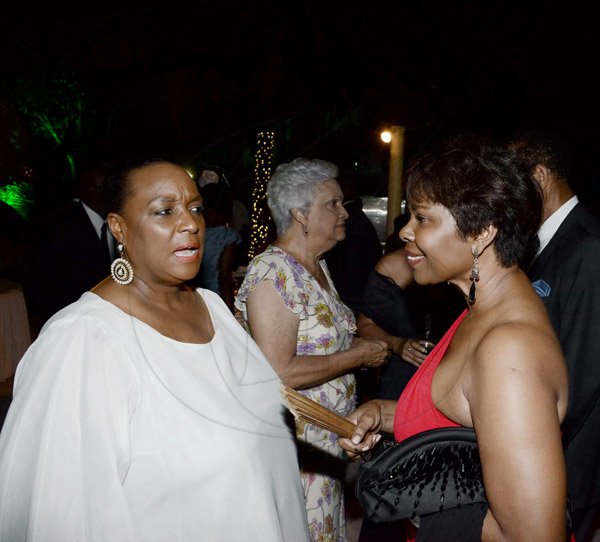 Winston Sill/Freelance Photographer
BUSINESS DESK:----- Sagicor Group Jamaica Annual Corporate Staff Awards Ceremony, held at the Jamaica Pegasus Hotel, New Kingston on Wednesday night march 12, 2014.  Here are Jacquline Coke-Lloyd (left); and Jacinth Byles (right).