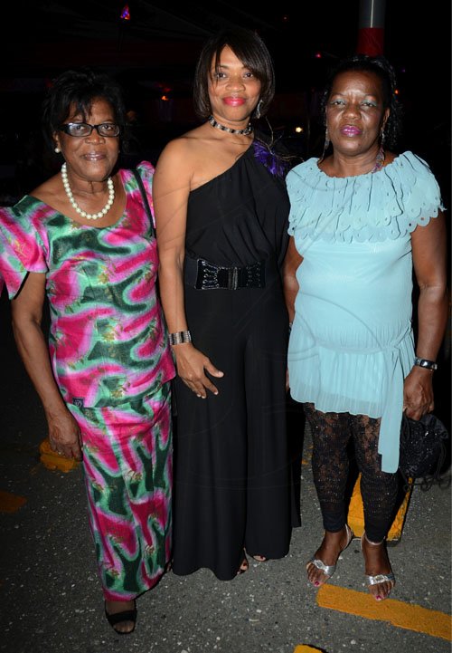 Rudolph Brown/Photographer
From left Sylvia Bogle, Laurette Singh and Lillias Mowatt at the Sagicor Christmas party at the office car park in New Kingston on Saturday, December 3-2011