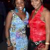 Rudolph Brown/Photographer
Andrice Fagan (left) is caught on camera  with Maureen Williams.


********************************************************************** at the Sagicor Christmas party at the office car park in New Kingston on Saturday, December 3-2011