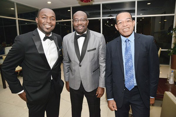 Rudolph Brown/Photographer
Business Desk
Merrick Plummer, (left) Assistant VP Individual Line Sales and Distribution pose with Michael Willacy, (right) and Karl Williams, vice-president, Group Human Resource at the Sagicor Corporate Awards Jamaica Pegasus Hotel on Wednesday, March 23, 2016