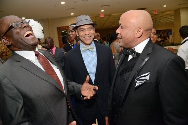 Rudolph Brown/Photographer
Business Desk
Deputy CEO of Sagicor Bank Jamaica, Phillip Armstrong, (centre) chat with Mark Chisholm, (right) Executive VP, Individual Line of Sagicor and Rudolph Daley at the Sagicor Corporate Awards Jamaica Pegasus Hotel
on Wednesday, March 23, 2016