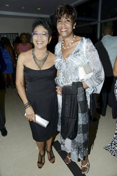 Rudolph Brown/Photographer
Arlene Lawrence, (left) pose with Michelle Distanr at Sagicor Jamaica Group 42 Annual Corporate Awards at the Jamaica Pegasus Hotel on Wednesday, March 20, 2013