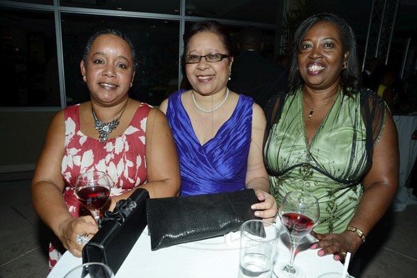 Rudolph Brown/Photographer
From left are Megon Irvine, Angela Ching, Curlinea Spence at Sagicor Jamaica Group 42 Annual Corporate Awards at the Jamaica Pegasus Hotel on Wednesday, March 20, 2013