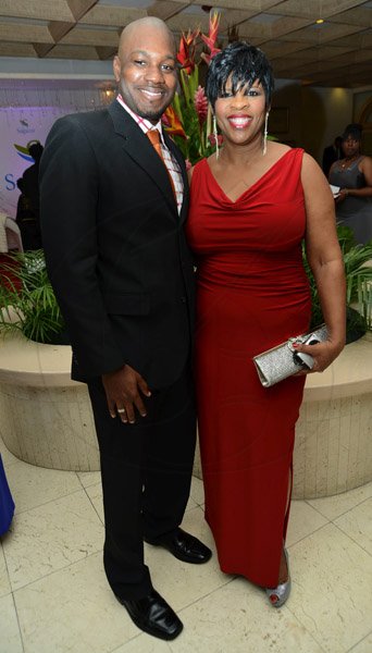Rudolph Brown/Photographer
Nicholas Price pose with Marcia richards at Sagicor Jamaica Group 42 Annual Corporate Awards at the Jamaica Pegasus Hotel on Wednesday, March 20, 2013