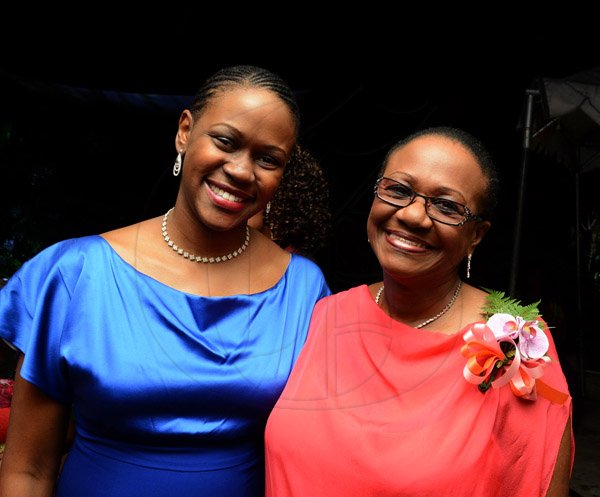 Winston Sill/Freelance Photographer
PUBLIC AFFAIRS DESK:------ Mariame McIntosh-Robinson (left) came out to support mom Fay McIntosh who was presented with the Saint Award by her alma mater St Andrew High School for Girls at the Old Girls Association annual Valentine Dinner and Dance, held at Terra Nova All-Suite Hotel, Waterloo Road on Saturday night February 7, 2015.