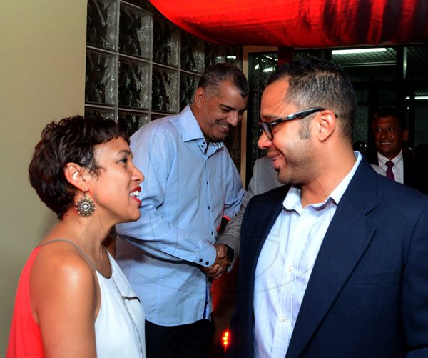 Winston Sill/Freelance Photographer
Scotiabank's President and CEO Jacqueline Sharp host Scotiabank 125th Anniversary Cocktails and Concert, held at Courtleigh Auditorium, St. Lucia Avenue, New Kingston on Thursday night September 4, 2014. Here are Jacqueline Sharp (left); Jason sharp (centre); and Dr. Shane Alexis (right).