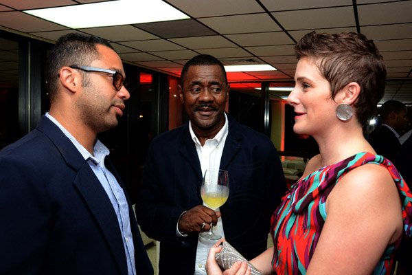 Winston Sill/Freelance Photographer
Scotiabank's President and CEO Jacqueline Sharp host Scotiabank 125th Anniversary Cocktails and Concert, held at Courtleigh Auditorium, St. Lucia Avenue, New Kingston on Thursday night September 4, 2014. Here are Dr. Shane Alexis (left); Harry Smith (centre); and Debra Lopez-Spence (right).