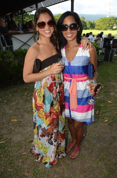 Rudolph Brown/Photographer
Kate Hendrickson, (left) Manager of Courtleigh pose with Samantha Ray at the Scotia Private Client Group Jamaica Open Polo tournament at Caymanas Estate on Sunday, April 29-2012