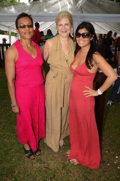 Rudolph Brown/Photographer
Christina Taylor, (right) pose with Kathy Scimeme  (centre) and Georgette Manning  at the Scotia Private Client Group Jamaica Open Polo tournament at Caymanas Estate on Sunday, April 29-2012