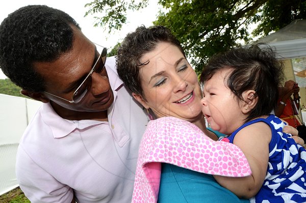 Rudolph Brown/Photographer
Debra Lopez-Spence and her husband Mel Spence with their Baby Emmanuelle Spence at the Scotia Private Client Group Jamaica Open Polo tournament at Caymanas Estate on Sunday, April 29-2012