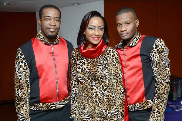 Rudolph Brown/Photographer
Alexia Ximines pose with Stephen Coates, (left) and Tarike Patterson at the Scotiabank Sales Conference 2014 awards "We Dominated We Conquered Now hear us ROAR" at the Jamaica Conference Centre on Saturday January 25,2014