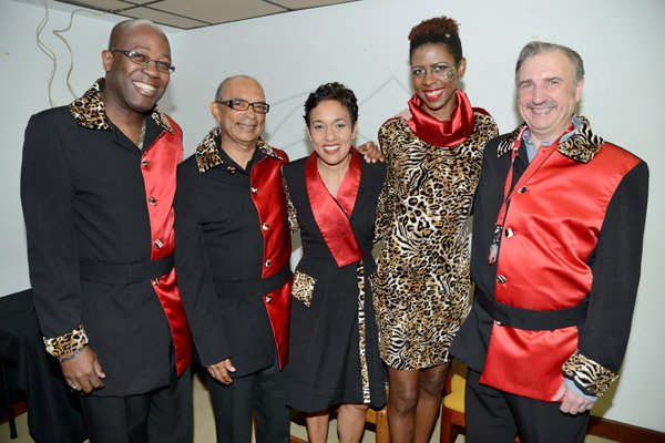 Rudolph Brown/Photographer
Jacqueline Sharp, (centre) President and CEO Scotiabank Group pose with from left Hugh Reid, President of Scotia Life Insurance, Wayne Powell, VP Retail Banking, Shereen Duncan and Scotia Senior VP Norm Stevenson at the Scotiabank Sales Conference 2014 awards "We Dominated We Conquered Now hear us ROAR" at the Jamaica Conference Centre on Saturday January 25,2014