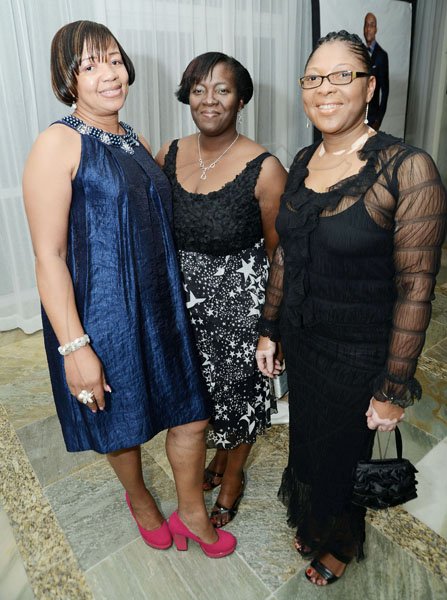 Rudolph Brown/Photographer
Sandra Walters, (left) pose with Audrey Morgan, (right) and Winsome McCarthy at the Scotia Insurance Life Stars awards 2012 ceremony at the Hilton Rose Hall Hotel in Montego Bay on Saturday, January 12, 2013.