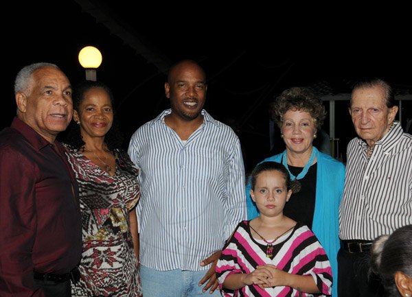 Winston Sill/Freelance Photographer
The Most Hon. Edward Seaga share Birthday Party with son Christopher Seaga and Minister Dr. Omar Davies, held at Russell Heights on Tuesday night May 28, 2013.  Here are Dr. Davies (left); Rose Davies (second left); Christopher Seaga (centre); Carla Seaga (second right); Eddie Seaga (right); and Gabrielle Seaga (front).