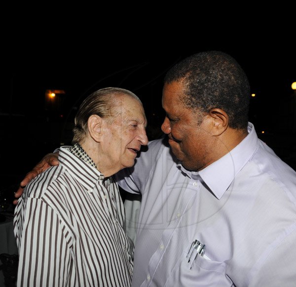 Winston Sill/Freelance Photographer
The Most Hon. Edward Seaga share Birthday Party with son Christopher Seaga and Minister Dr. Omar Davies, held at Russell Heights on Tuesday night May 28, 2013.  Here are Seaga (left); and Minister Roger Clarke (right).