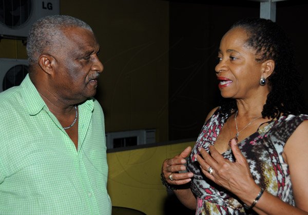 Winston Sill/Freelance Photographer
The Most Hon. Edward Seaga share Birthday Party with son Christopher Seaga and Minister Dr.Omar Davies, held at Russell Heights on Tuesday night May 28, 2013. Here are Glen Christian (left); and Rose Davies (right).