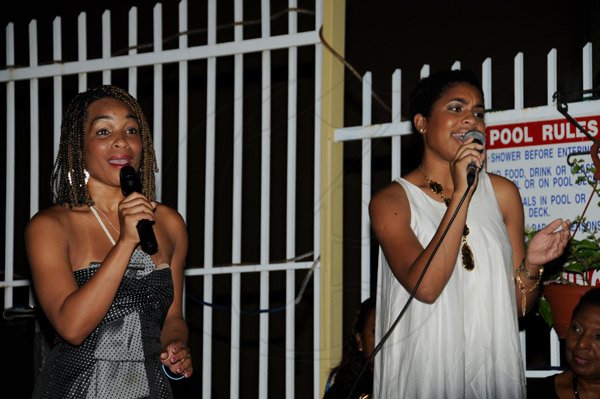 Winston Sill/Freelance Photographer
The Most Hon. Edward Seaga share Birthday Party with son Christopher Seaga and Minister Dr. Omar Davies, held at Russell Heights on Tuesday night May 28, 2013.  Here are singing Strachan sisters, Ana (left); and Samantha (right).