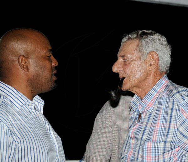 Winston Sill/Freelance Photographer
The Most Hon. Edward Seaga share Birthday Party with son Christopher Seaga and Minister Dr. Omar Davies, held at Russell Heights on Tuesday night May 28, 2013.  Here are Christopher seaga (left); and Hugh Hart (right).