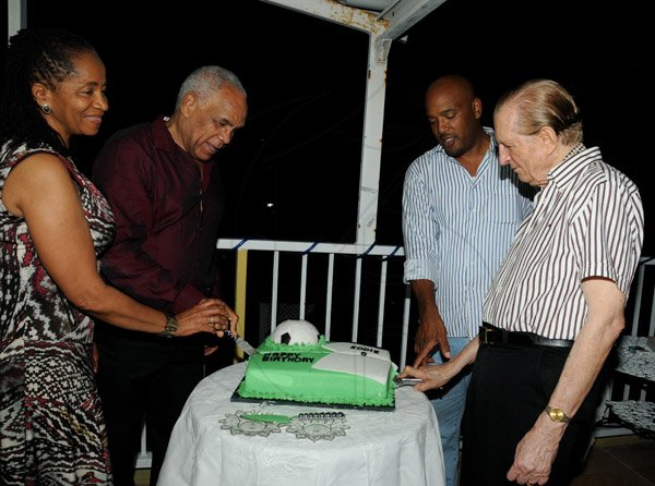 Winston Sill/Freelance Photographer
The Most Hon. Edward Seaga share Birthday Party with son Christopher Seaga and Minister Dr. Omar Davies, held at Russell Heights on Tuesday night May 28, 2013.  Here are Rose Davies (left); Dr. Davies (second left); Christopher Seaga (second right); and Seaga (right).