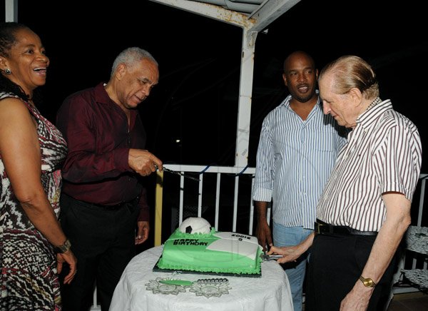 Winston Sill/Freelance Photographer
The Most Hon. Edward Seaga share Birthday Party with son Christopher Seaga and Minister Dr. Omar Davies, held at Russell Heights on Tuesday night May 28, 2013.  Here are Rose Davies (left); Dr. Davies (second left); Christopher Seaga (second right); and Seaga (right).
