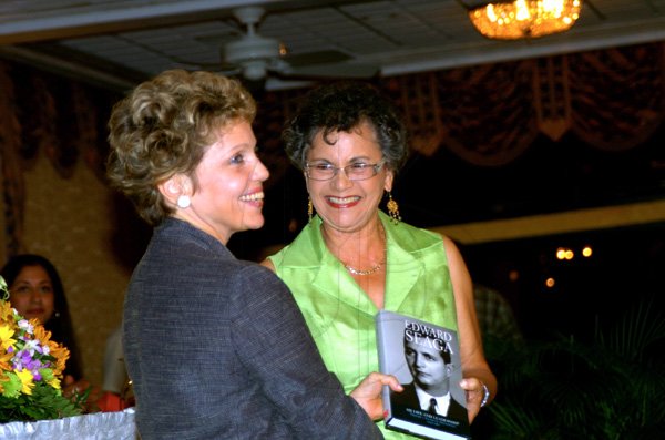 Winston Sill / Freelance Photographer
Carla Seaga (left), wife of former Prime Minister Edward Seaga, presents a copy of her husband's book to Dr Fay Whitbourne-Morrison at the launch.

*****************************************************************


Launch of Edward Seaga book- "My Life And Leadership, volume one: Clash of Ideologies,1930--1980", held at Mona Visitor's Lodge, UWI Campus on Wednesday March 3
, 2010. Here