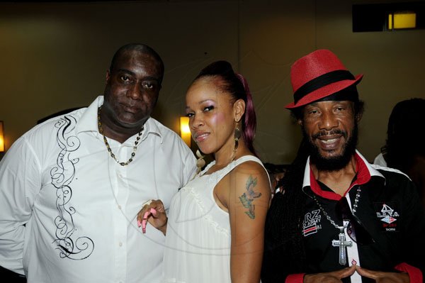 Winston Sill / Freelance Photographer
Hon. Edward Seaga lauch Reggae Golden Jubilee CD's, held at Jamaica Pegasus Hotel, New Kingston on Friday night October 19, 2012. Here are Admiral Bailey (left); Paulette Davis (centre); and Tinga Stewart (right).