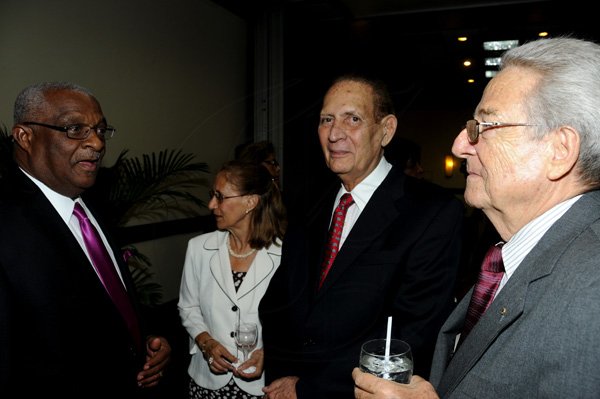 Winston Sill / Freelance Photographer
Leader of the Jamaica Labour Party (JLP) Andrew Holness host Reception in honour of The Most Hon. Edward Seaga, held at the Jamaica Pegasus Hotel, New Kingston on Tuesday night October 9, 2012. Here are Glen Christian (left); Mrs Peter Bangerter (second left); Michael Ammar Sn.; and Peter Bangerter (right).
.
