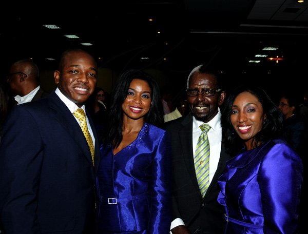 Winston Sill / Freelance Photographer
Charles Family: Pernell Charles Jr. (left poses with twin sisters  Dr. Michelle Charles (second left); and Carol Charles (right) and  dapper  daddy  Pernell Charles, snr. 




Leader of the Jamaica Labour Party (JLP) Andrew Holness host Reception in honour of The Most Hon. Edward Seaga, held at the Jamaica Pegasus Hotel, New Kingston on Tuesday night October 9, 2012. HEre are Pernell Charles Jr. (left); Dr. Michelle Charles (second left); Pernell Charles (second right), Dad; and Carol Charles (right).