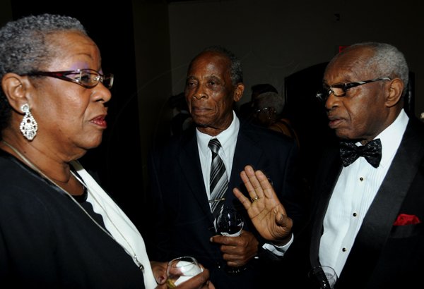 Winston Sill / Freelance Photographer
The St. Elizabeth Homecoming Foundation Limited (SEHF) 20th Annual Golden Awards Banquet, held at the Jamiaca Pegasus Hotel, New Kingston on Wednesday night November 28, 2012. Here are Karen Gentles (left); St. John Hutton (centre); and Crafton Miller (right).