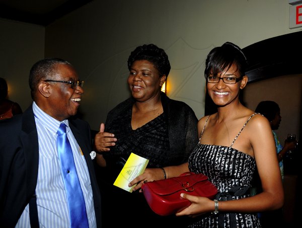 Winston Sill / Freelance Photographer
The St. Elizabeth Homecoming Foundation Limited (SEHF) 20th Annual Golden Awards Banquet, held at the Jamiaca Pegasus Hotel, New Kingston on Wednesday night November 28, 2012. Here are George Watson (left), Dolsie Allen (centre); and Racquelia Gayle (right).