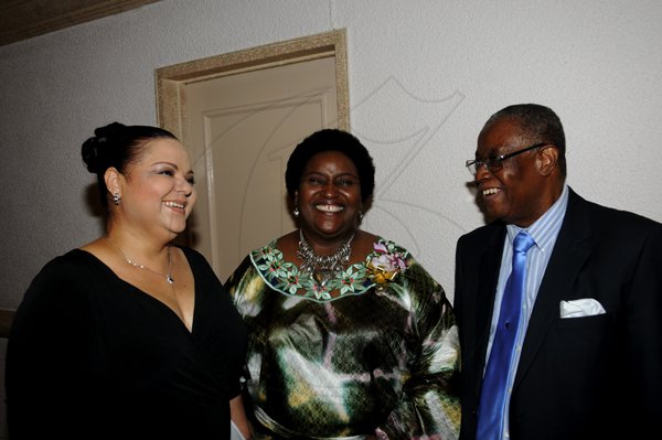 Winston Sill / Freelance Photographer
The St. Elizabeth Homecoming Foundation Limited (SEHF) 20th Annual Golden Awards Banquet, held at the Jamiaca Pegasus Hotel, New Kingston on Wednesday night November 28, 2012. Here are Senator Sandrea Falconer (Left); Donna Parchment Brown (centre), Chairman, SEHT; and George Watson (right), Founder and CEO, SEHF.