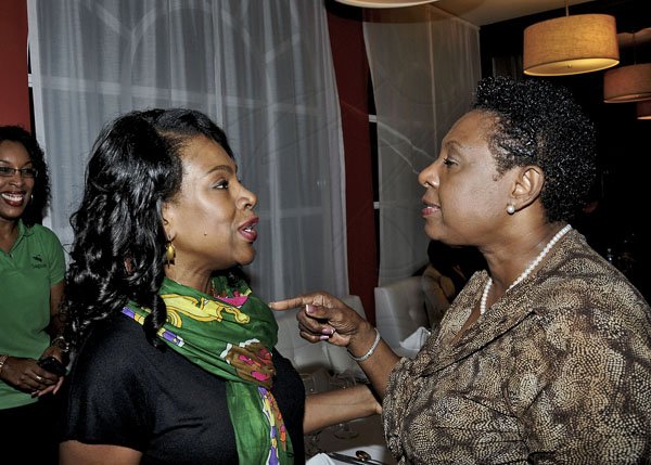 Winston Sill / Freelance Photographer
Spanish Court Hotel host Sheryl Lee-Ralph to dinner,held at the St. Lucia AvenueComplex, New Kingston on Wednesday night September 26, 2012. Here are Sheryl Lee-Ralph (left); and Olivia Grange (right).