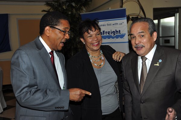 Ian Allen/Photographer
Grantley Stephenson (left) past president of the Shipping Association of Jamaica (SAJ) and Corah-Ann Robertson-Sylvester (centre), member of the SAJ managing committee welcome Carlos Urriola Tam, president of the Caribbean Shipping Association. Tam was guest speaker at the 60th Anniversary Luncheon and Awards Ceremony for the Joint Industrail Council for the Port of Kingston which was held at the Terra Nova Hotel in Kingston on Wednesday