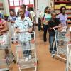 Rudolph Brown/Photographer
From left: Lime-Gleaner Inner-city Overachievers, Latoya Jibbison, Chevoy Craigie, Shaquille Thomas and Britney Hemmings and Korey Hamilton (partially hidden),  along with their parents participate in a shopping spree at Megamart, St Andrew yesterday.