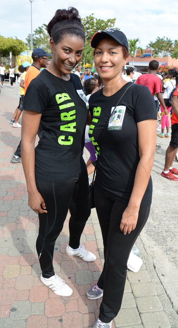 Rudolph Brown/Photographer
Denise Minto, (left) and Lystra Sharpe at the Sagicor Sigma Corporate Run at Emancipation Park in New Kingston on  Sunday, February 16, 2014