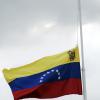 Norman Grindley/Chief Photographer
Venezuela flag fly half-mast at the Simon Bolivar Statue in Kingston yesterday.