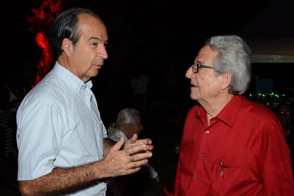 Winston Sill/Freelance Photographer
The Heart Foundation of Jamaica prersents the Media Launch of Simply Red, Wine and Food Festival, held at Millsborough Close on Tuesday night August 19, 2014. Here are Eduardo Bonilla Menchaca (left), Chile Ambassador; and Peter Bangerter (right).