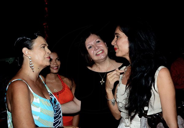 Winston Sill/Freelance Photographer
The Heart Foundation of Jamaica prersents the Media Launch of Simply Red, Wine and Food Festival, held at Millsborough Close on Tuesday night August 19, 2014. Here are Cindy Breakspeare-Bent (left); Laura Butler (second left); Martha Bonilia (second right); and Maria Toledo De Schmillen (right), wife of the new German Ambassador.