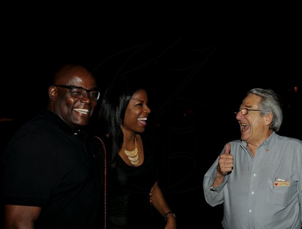 Winston Sill / Freelance Photographer
Heart Foundation of Jamaica  (HFJ) annual Wine and Food Festival, dubbed "Simply red and Wine Festival, held at Jamaica House Lawns on Friday night September 28, 2012. Here are Brian George (left); Kene?? Linton-George (centre); and Peter Bangerter (right).
